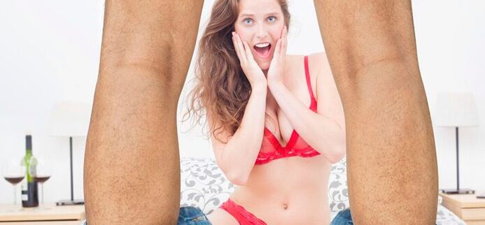 woman surprised by the increased size of the male penis photo 2